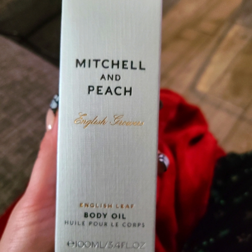 Mitchell and peach body oil